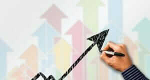 5 Digital Marketing Trends & How to Benefit From Them arrow trend on a chart